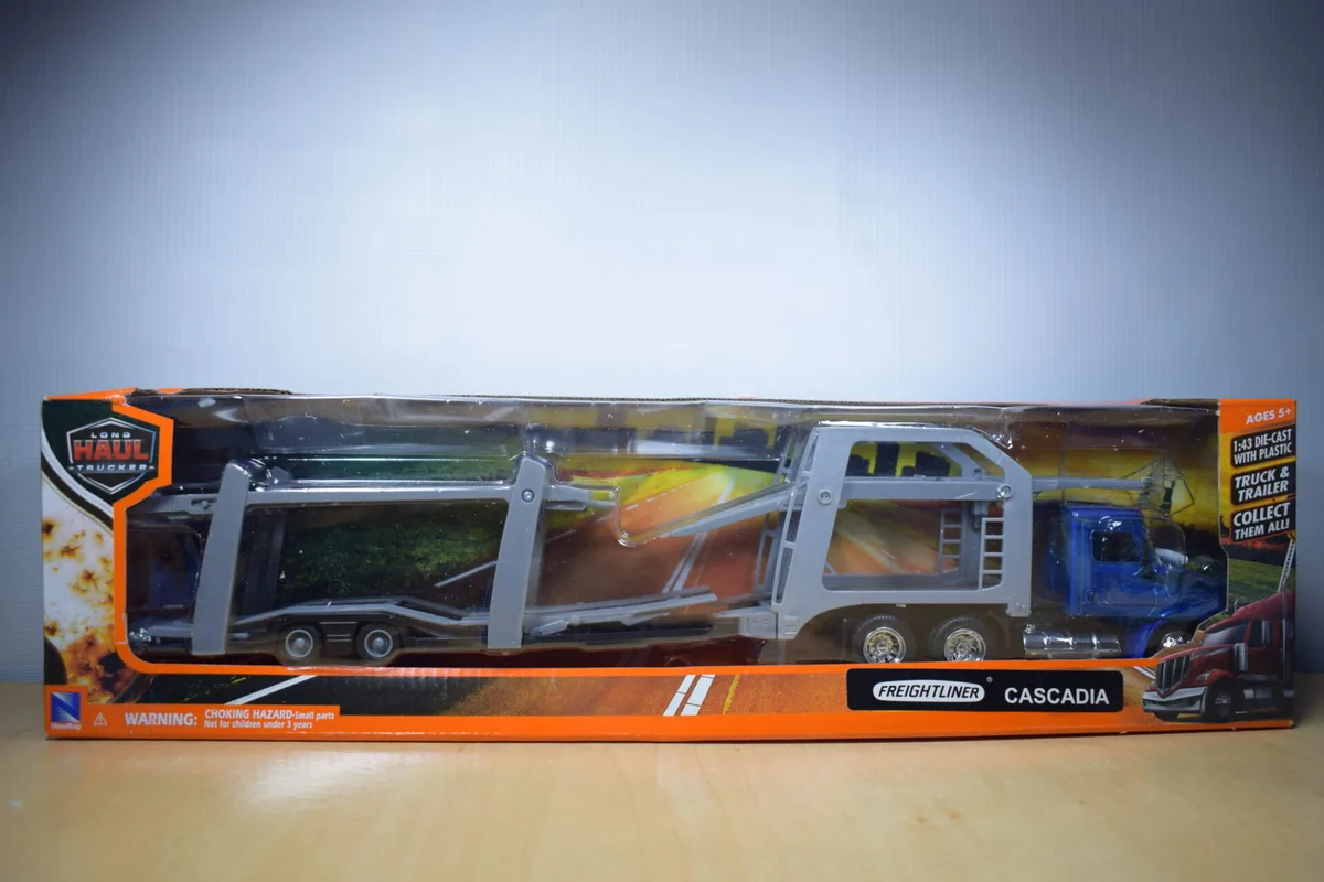 CAMION CIGÜEÑA O PORTACOCHES FREIGHTLINER CASCADIA